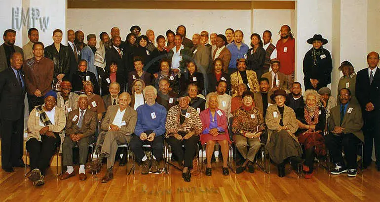 Historic 1990s photo of Renown African-American Fine Artists at the Schomburg Cultural Center in Harlem