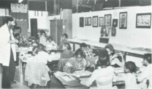 New Muse Community Museum -- lnstructor G. Falcon Beazer teaches a group of youngsters the rudiments of drawing.