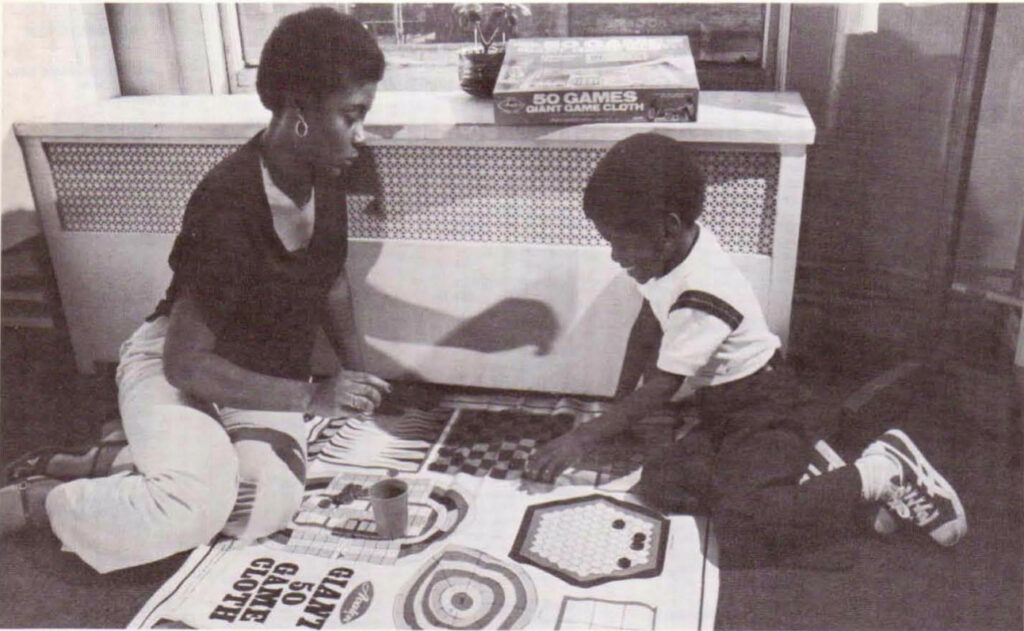 Mother and son playing a board game