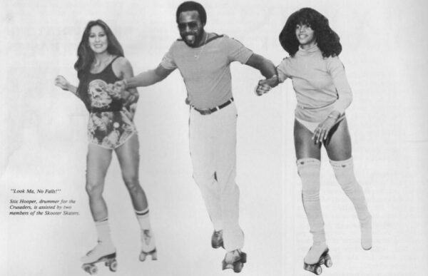 Look Ma, No Falls! Stix Hooper, drummer for the Crusaders, is assisted by two members of the Skooter Skaters -- Rollerskating: The Basics