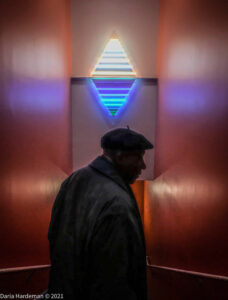 Ademola Silhouette in front of 7 ft Neon sculpture "New Harlem Pyramid", @DariaHardeman on Instagram