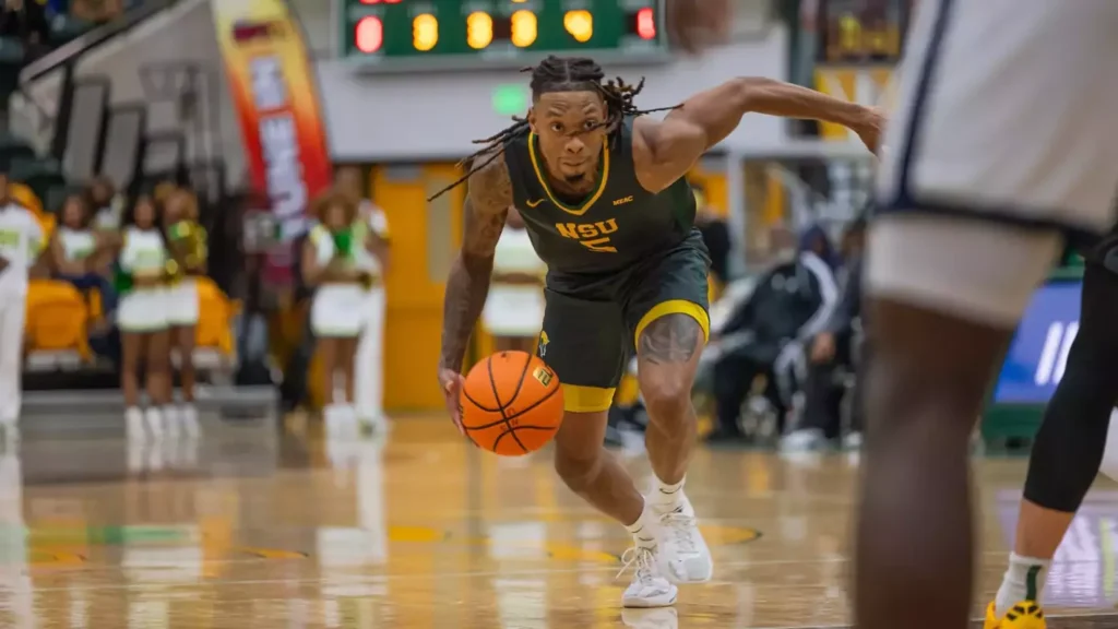 Born in Harlem, New York, and raised in Kingston, Brian Moore Jr. has emerged as a pivotal player for the Norfolk State Spartans.